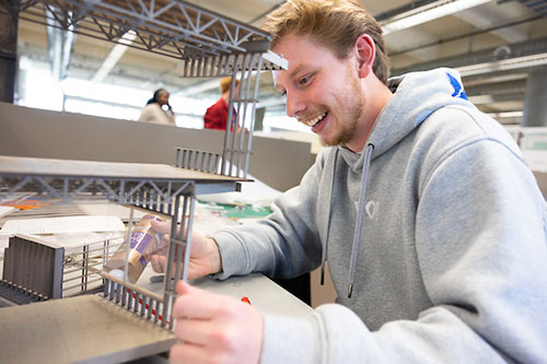 A CACM student Works on a project