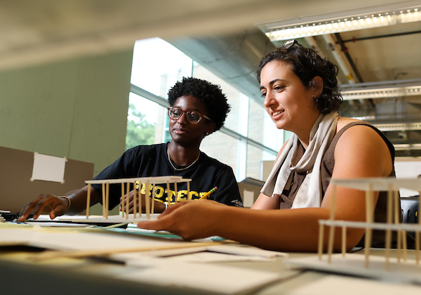 ksu architecture students in class working on model
