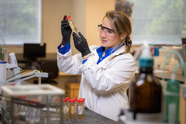 student in chemistry lab