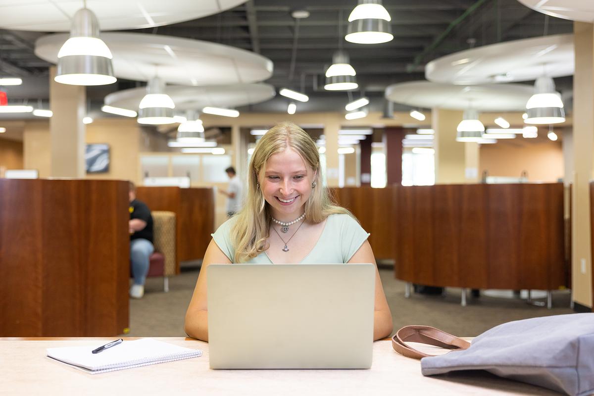 girl working on laptop