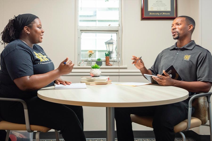 ksu student meeting with their student success coach.