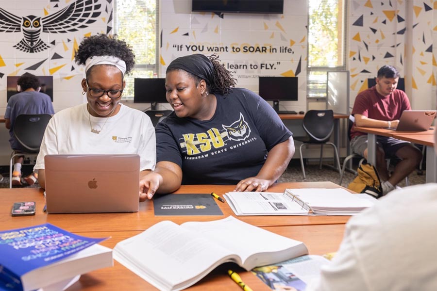ksu students collaborating at a table.