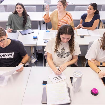 group of students at a student success workshop participating.