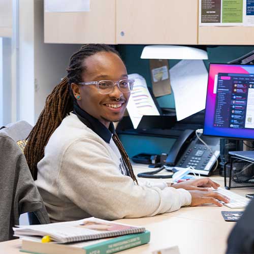 KSU student using a laptop