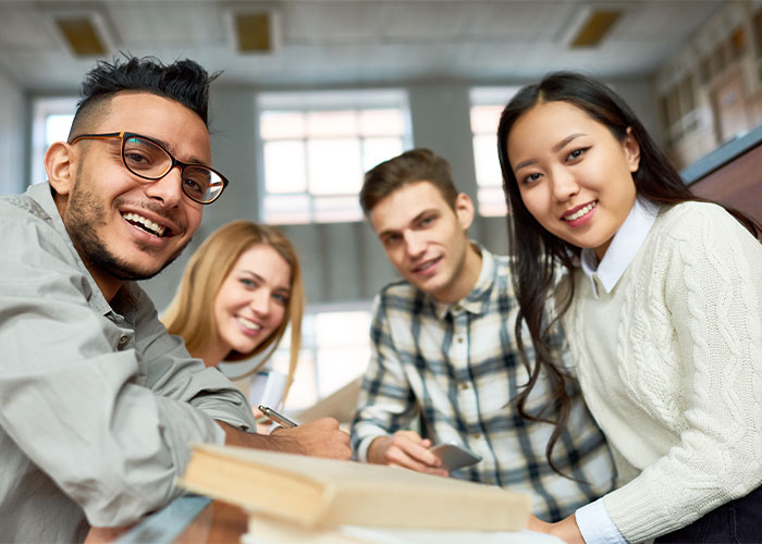 Group of young students smiling 