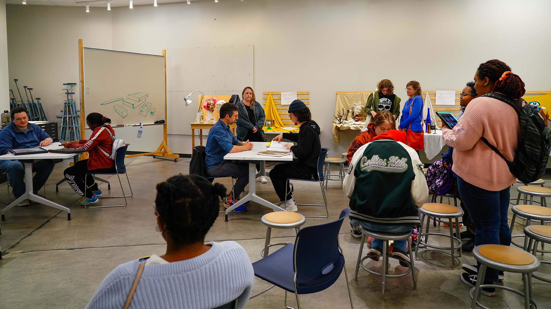  / Prospective students having their portfolios reviewed and waiting for their turn in our drawing studio. 