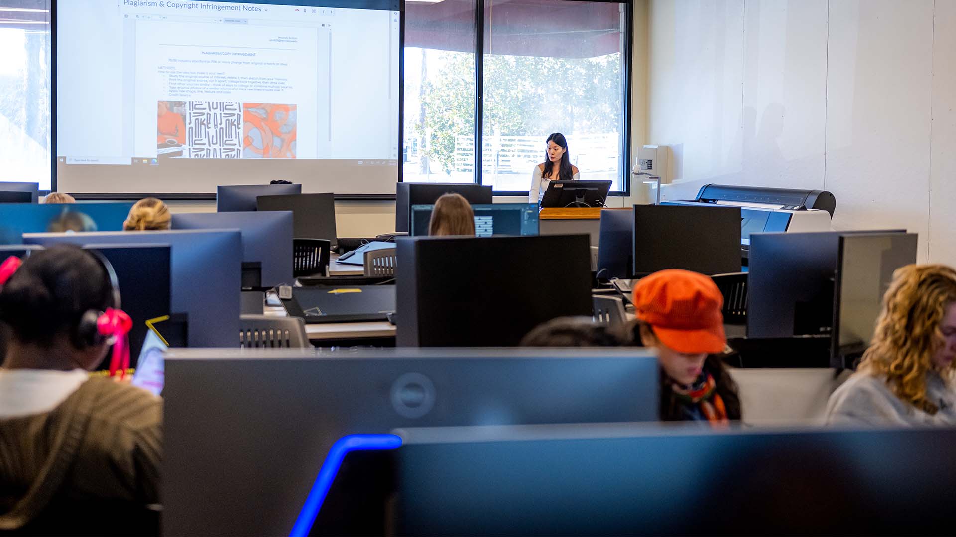  / Textiles students learning about patterns in computer lab classroom.