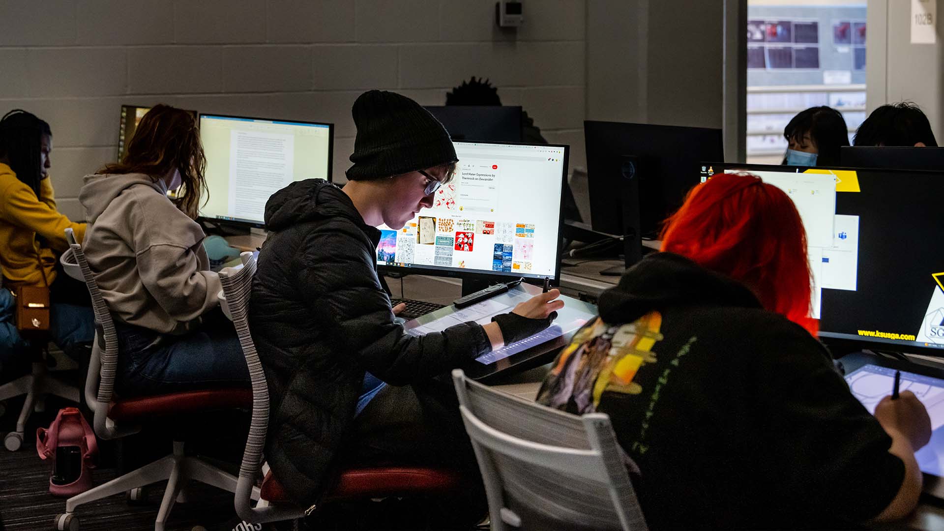  / Students in computer lab working on assignments.