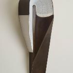 Bisect Steel and book pages 17'' x 5'' x 4'' 2014