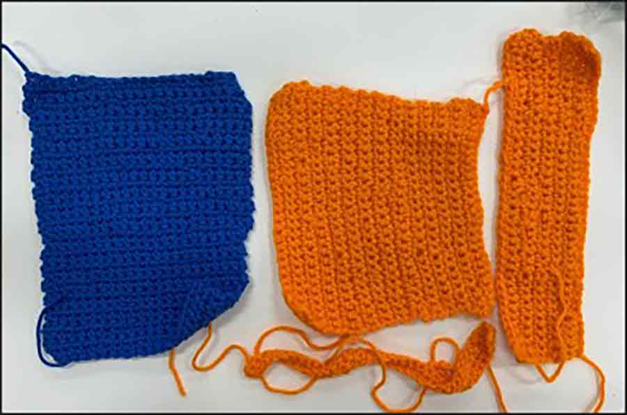 Crochet Pieces / Crochet pieces from a participant showing progress throughout the project using a slip knot, chain stitch, and single crochet. One piece was donated to Warm Up America.