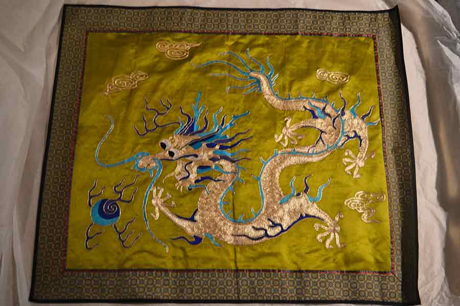 Sample photo of the Qing Dynasty embroidered tapestry for display in the Silken Threads exhibit. / Sample photo of the Qing Dynasty embroidered tapestry for display in the Silken Threads exhibit.y for display in the Silken Threads exhibit.
