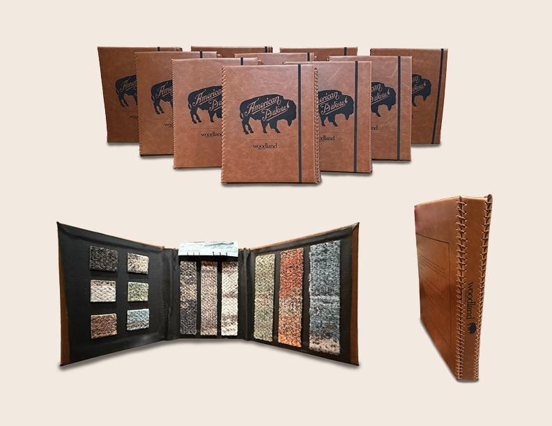  / I handmade 10 architectural folders showcasing American Dakota's Woodland Collection, a line of carpet planks that mimic real wood. The leather I used was etched by a local design shop, and I used traditional bookbinding techniques to wrap the leather around each folder panel.  