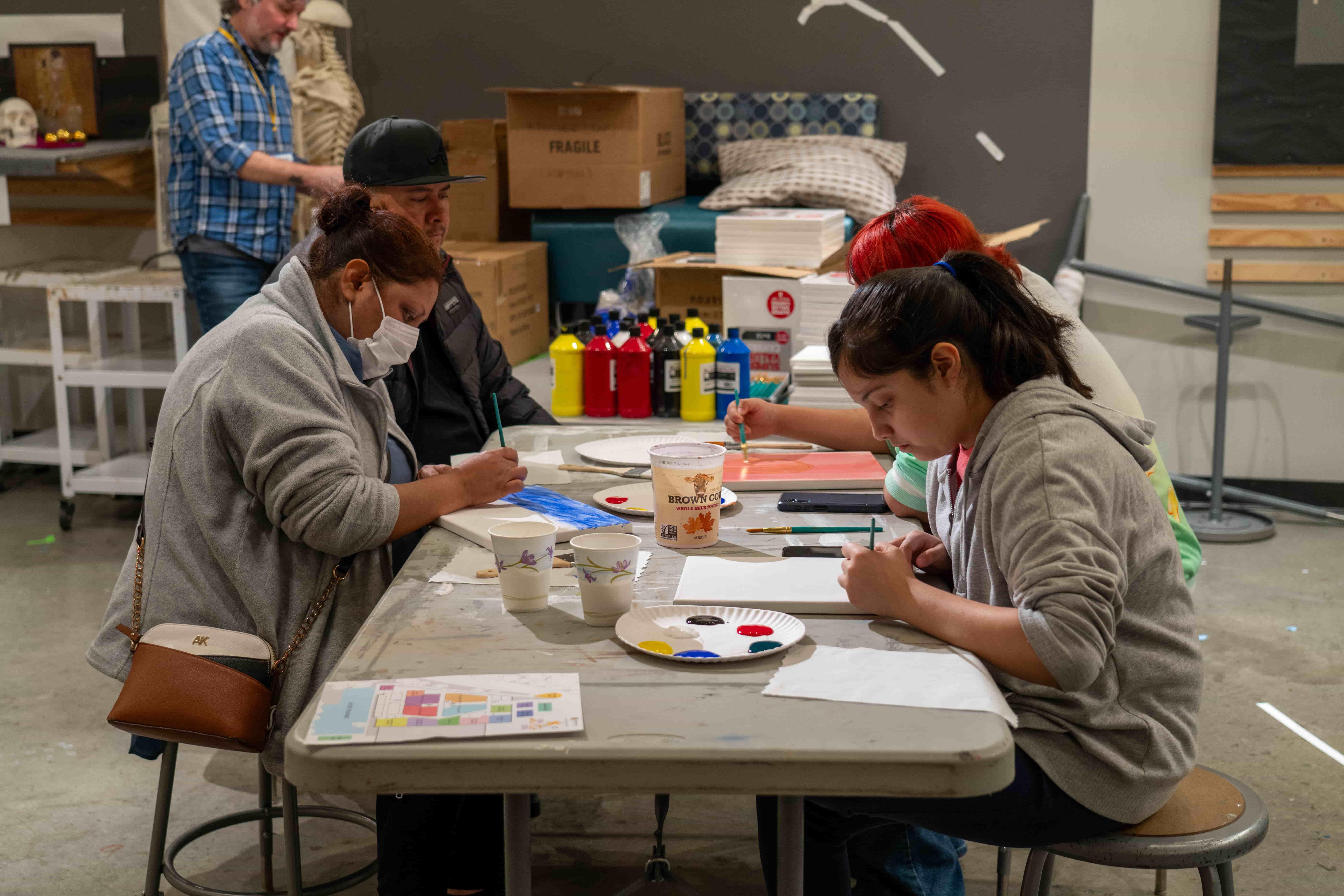 / K-12 students and parents painting