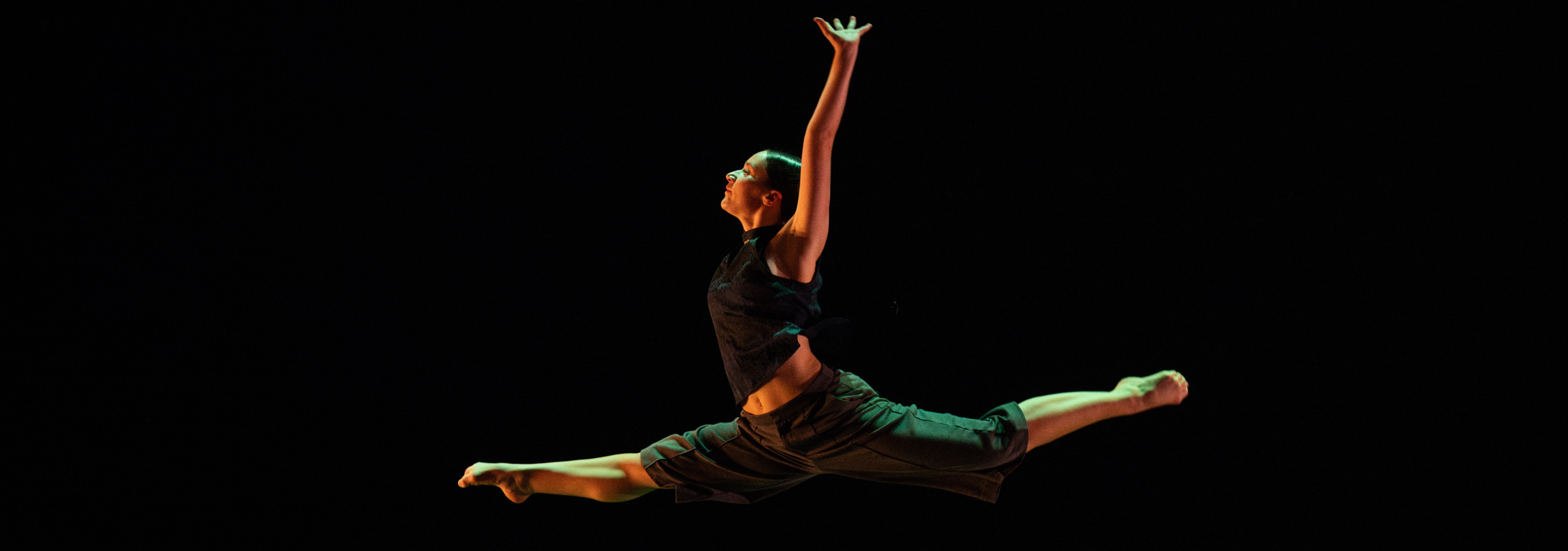 female dancer leaping in the air