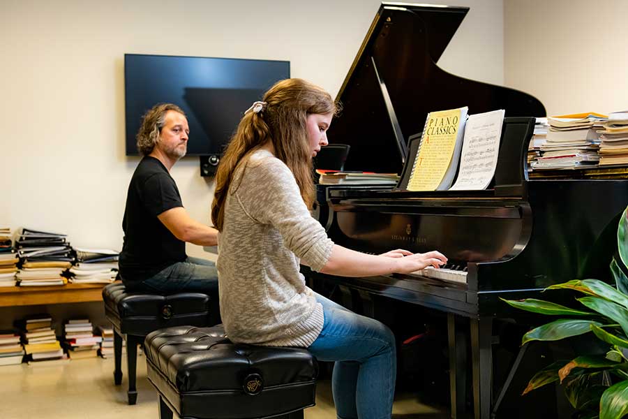 ksu pianists on the piano