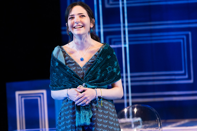 theatre performance of girl singing