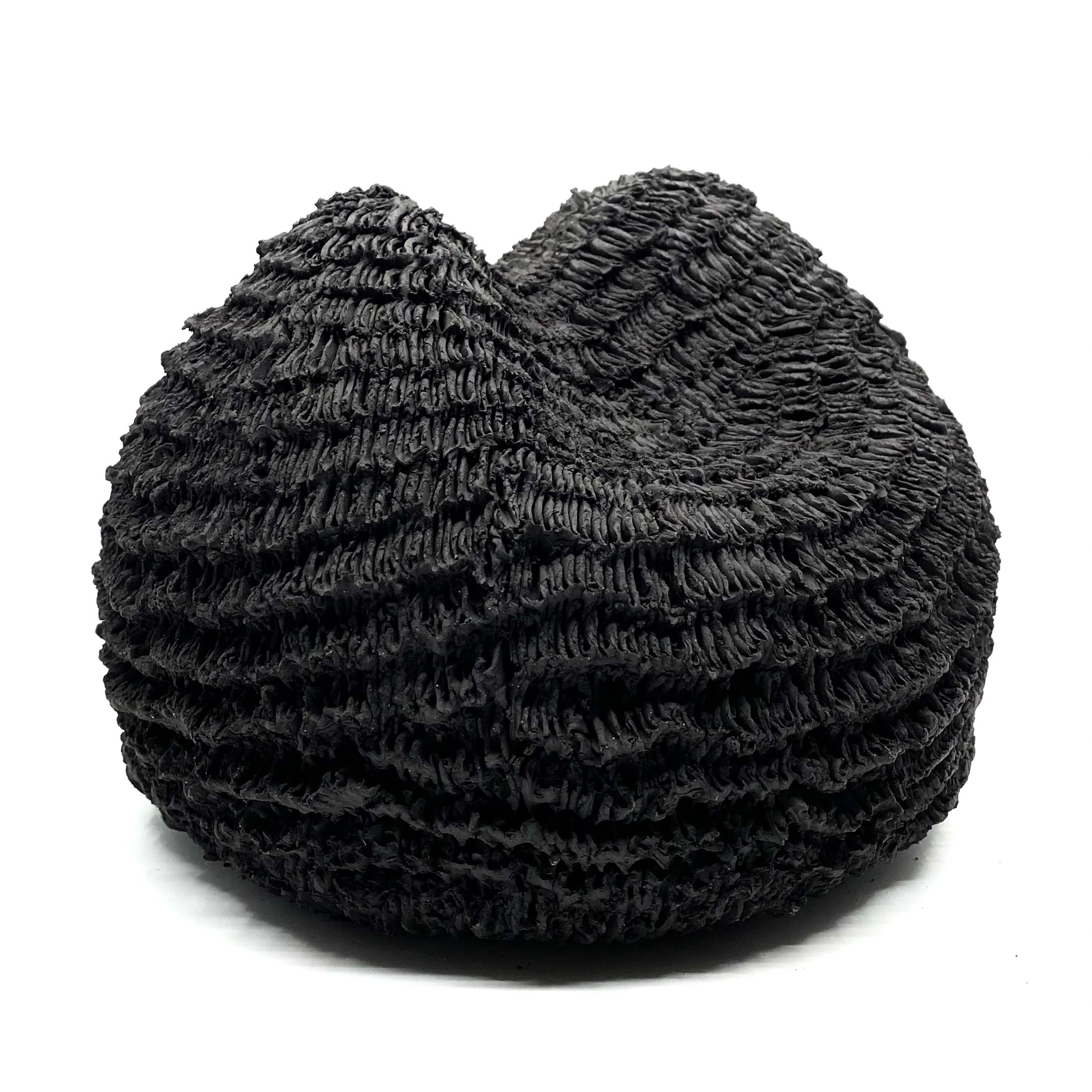 black textured ceramic art piece by donte hayes