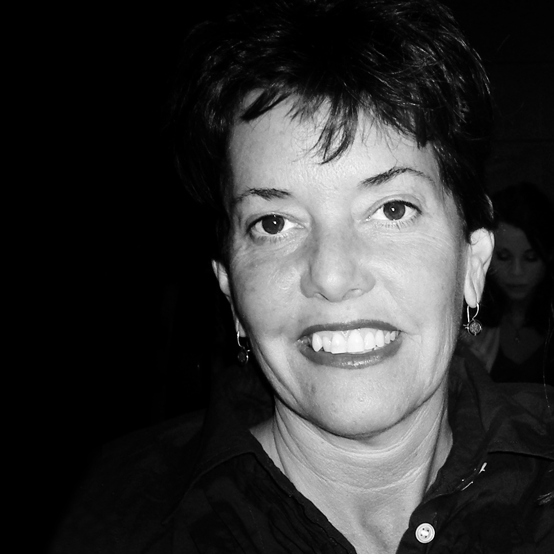 black and white headshot of a woman smiling