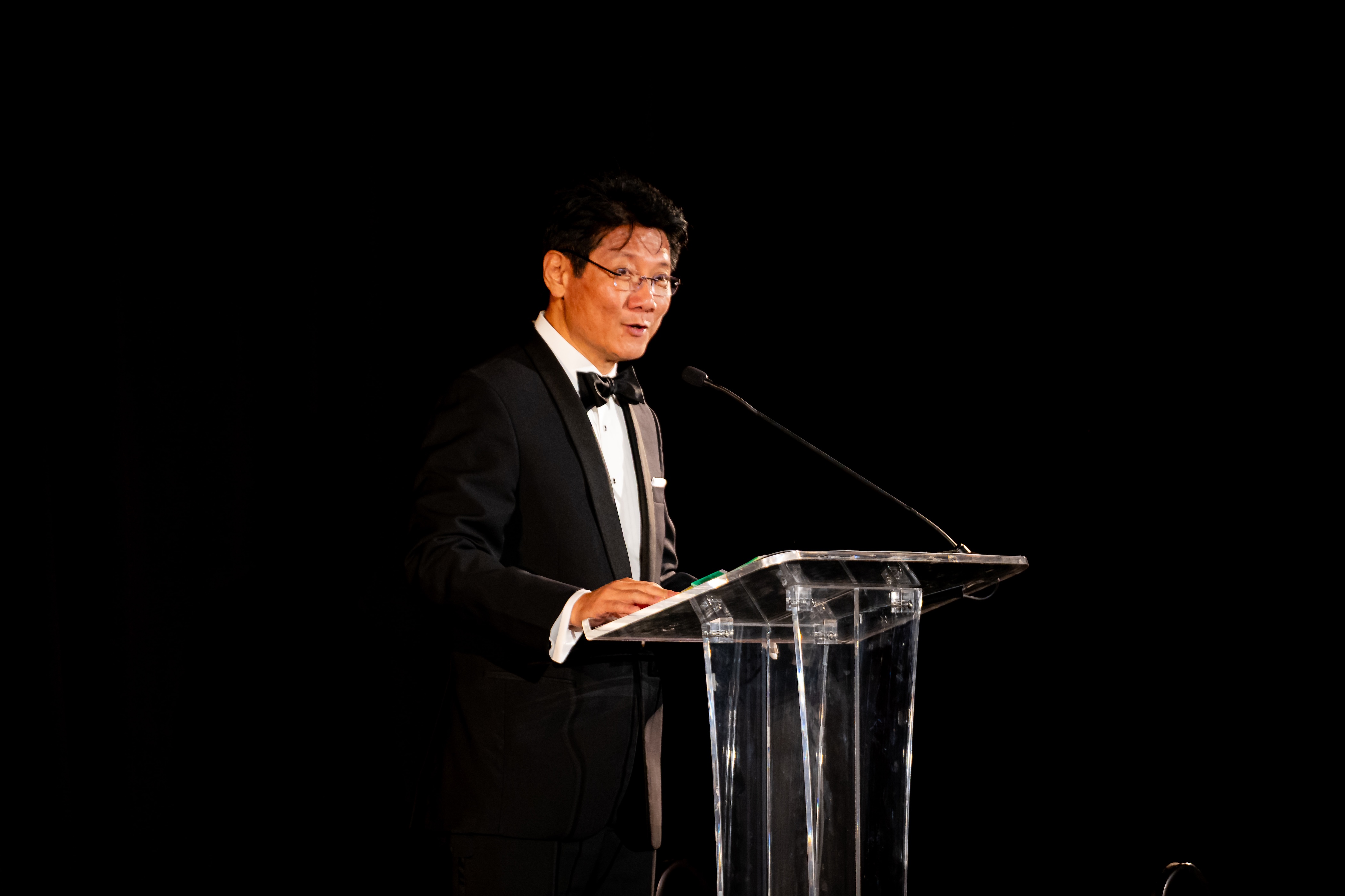 GCA Dean Arthur Liou speaking from a podium