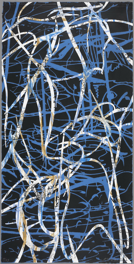 blue deisgns swirl on a handmade piece of paper