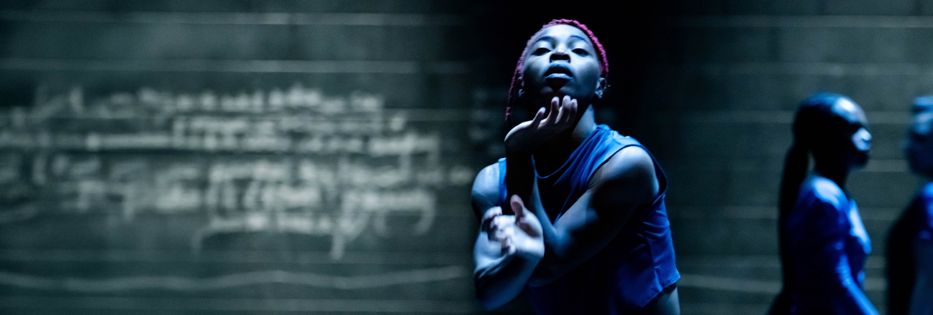 a modern dancer twirls her arms