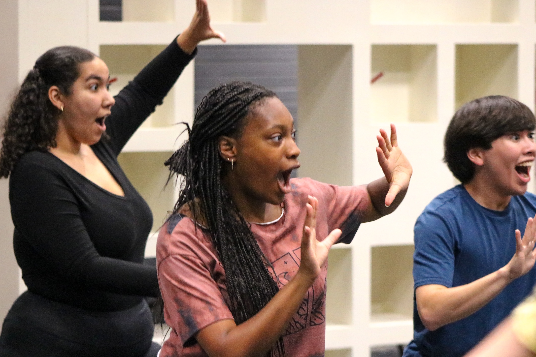 actors rehearse on stage for a production of Dance Nation