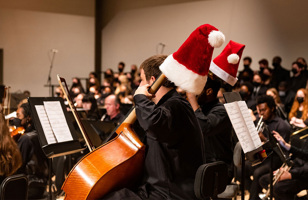 image of musician in santa hat 