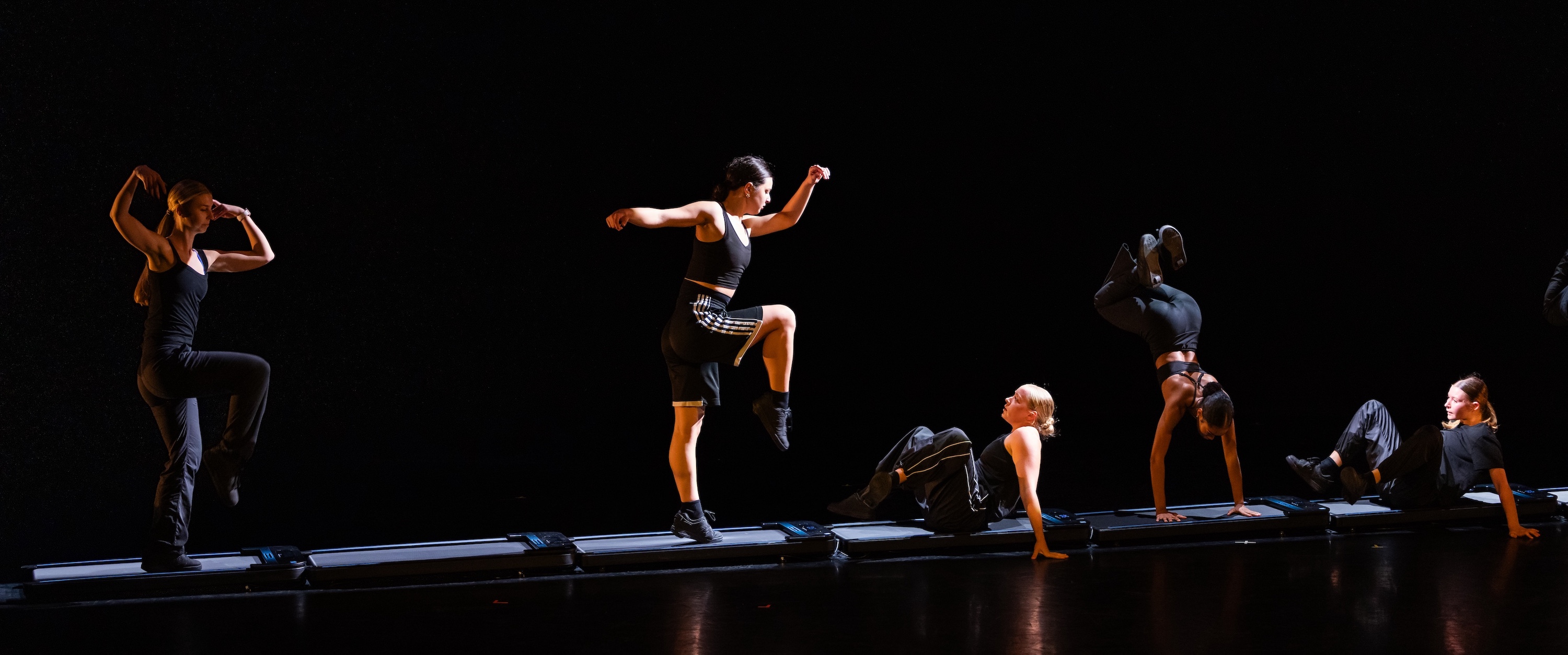 dancers prepare for concert in dress rehearsal