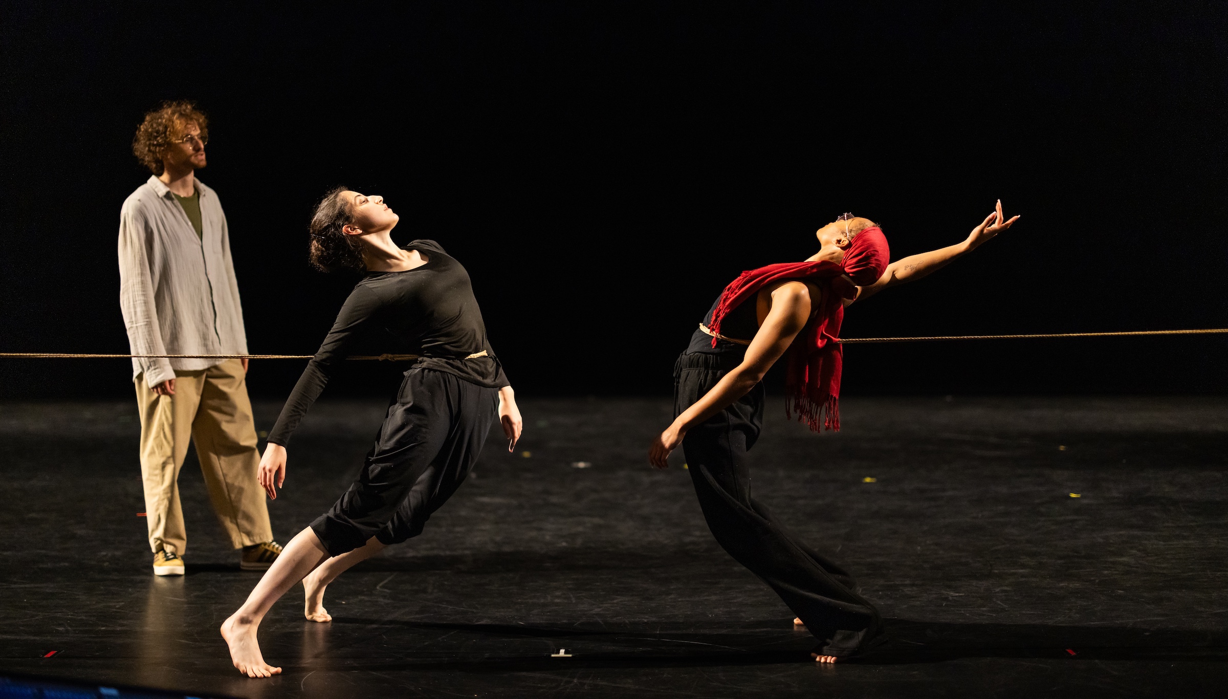 yankalle filtser prepares dancers for a concert as they dance with ropes