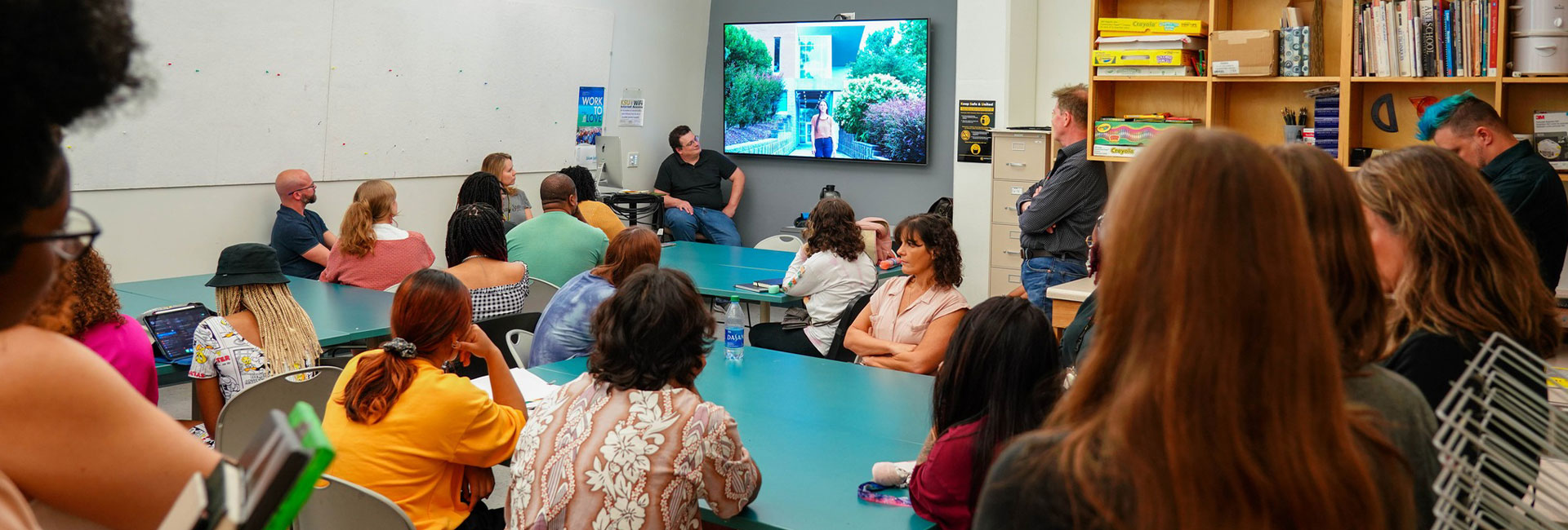 prospective students watching a video