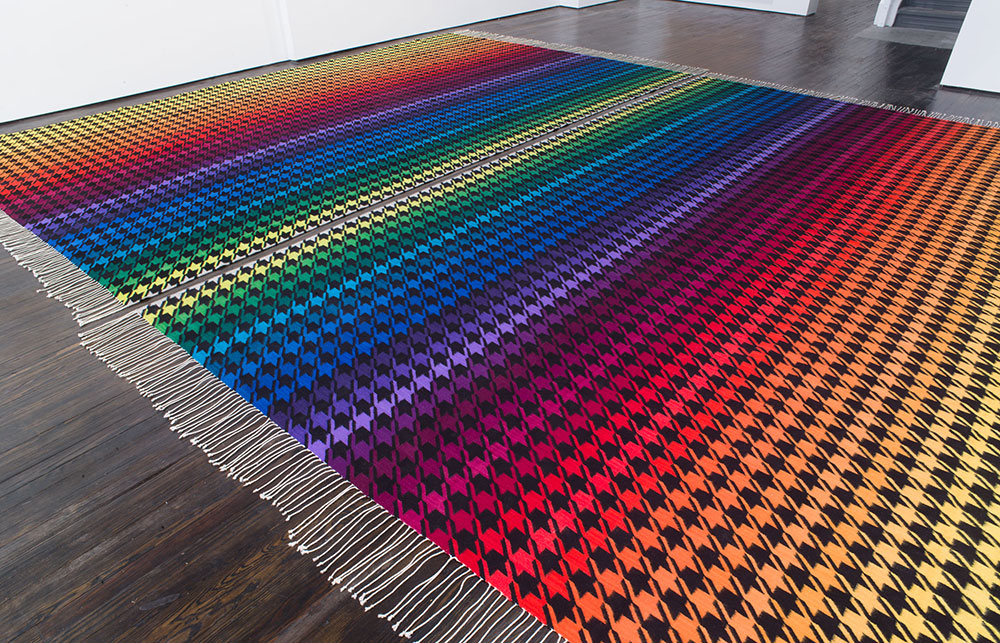 image of colorful houndstooth rug patterned after dior