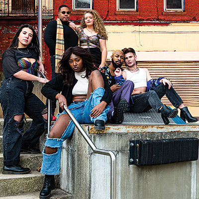 image of cast from rent sitting on the stoop
