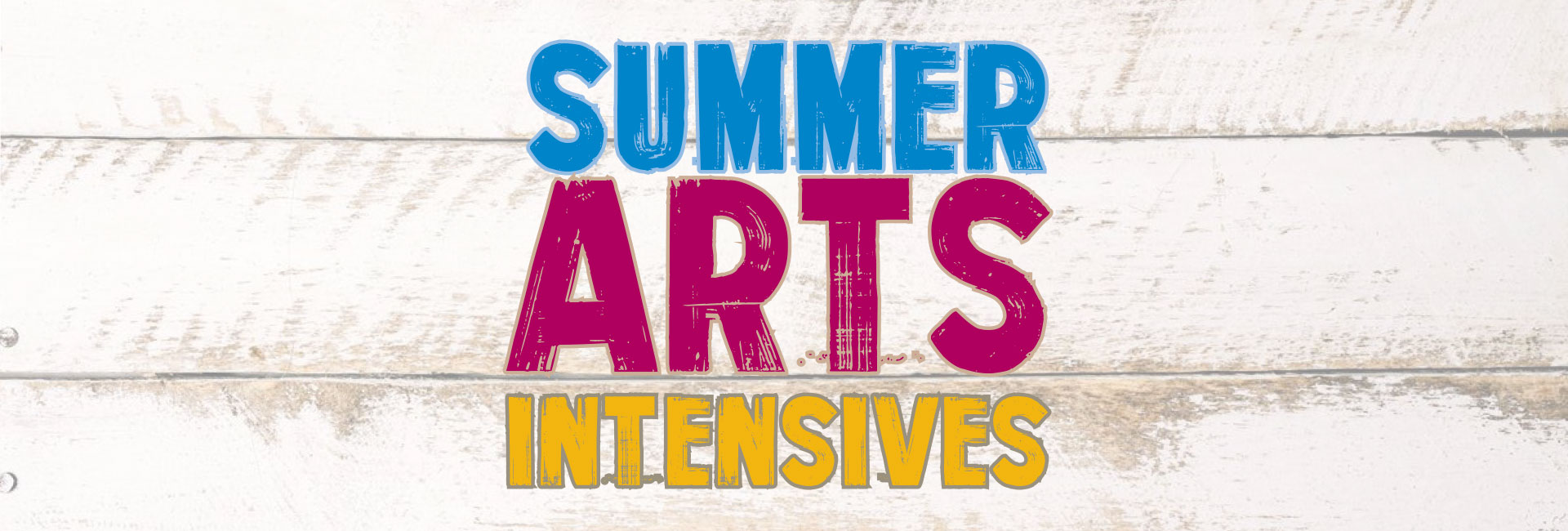 summer arts intensives in bright colors on wooden fence