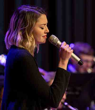 close-up of Kristin Houston singing