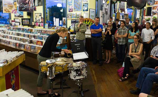 Katelyn King performing in a record store