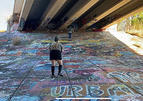  image of kids under a bridge