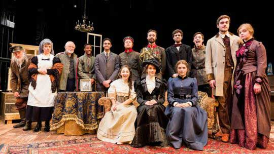 The “Three Sisters” cast poses in their costumes as they prepare for opening night. Photo credit: Cory Hancock