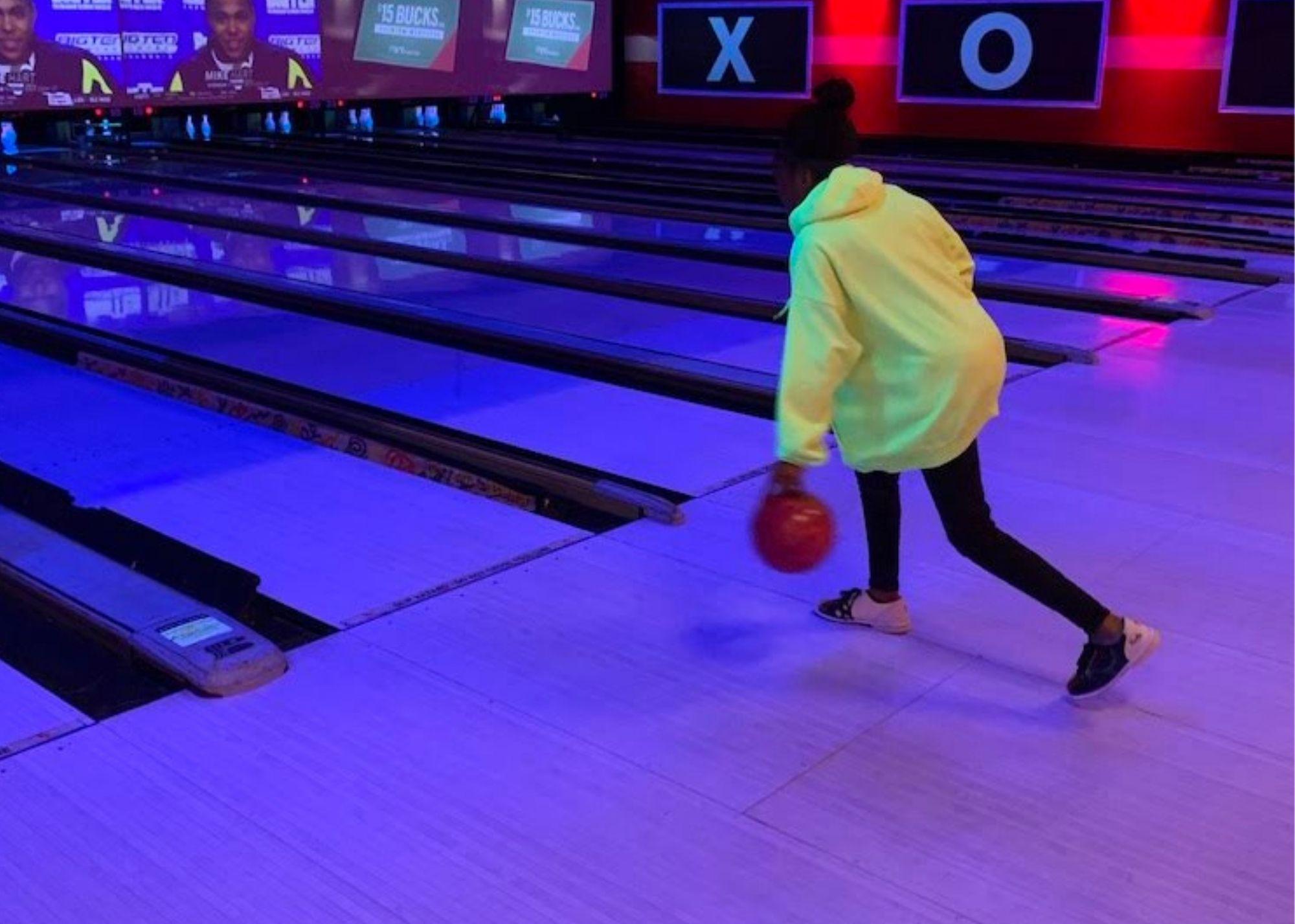 Young student bowling. / KSU TRIO students learn the physics behind everyday activities like bowling.