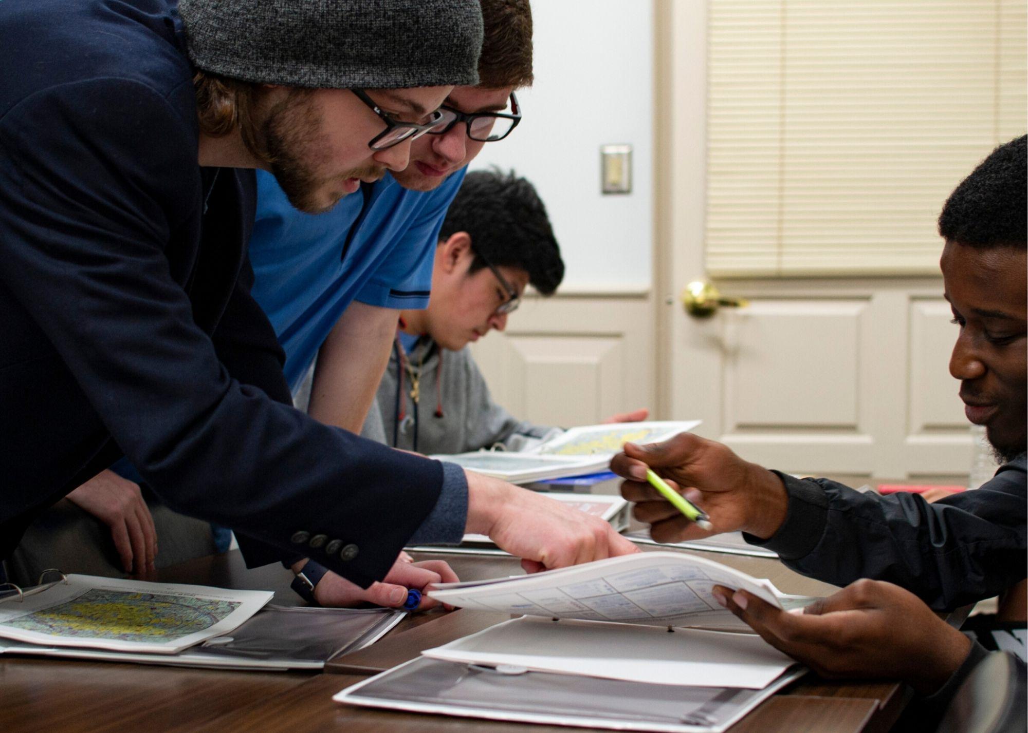 Students learning about the basics of drone flying / KSU TRIO's groundbreaking Drone Program introduces students to the basics of drone flying, ethics, and mechanics, and the program gives students the opportunity to test for their FAA Pilot's License