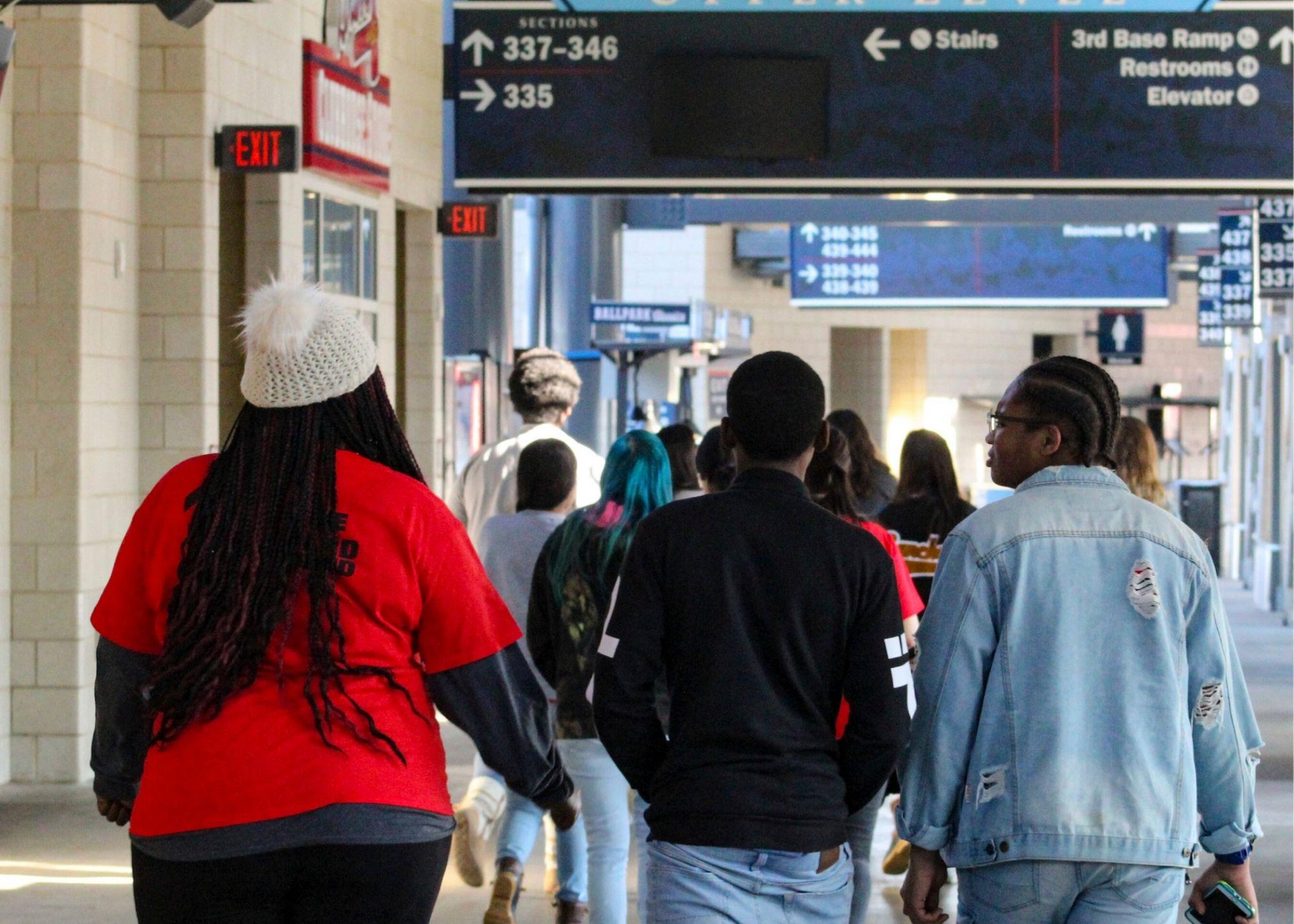 People walking through Suntrust Park stadium / KSU TRiO Upward Bound at Rockmart and Cedartown High Schools visit the Suntrust Park to learn about stadium construction and architecture.