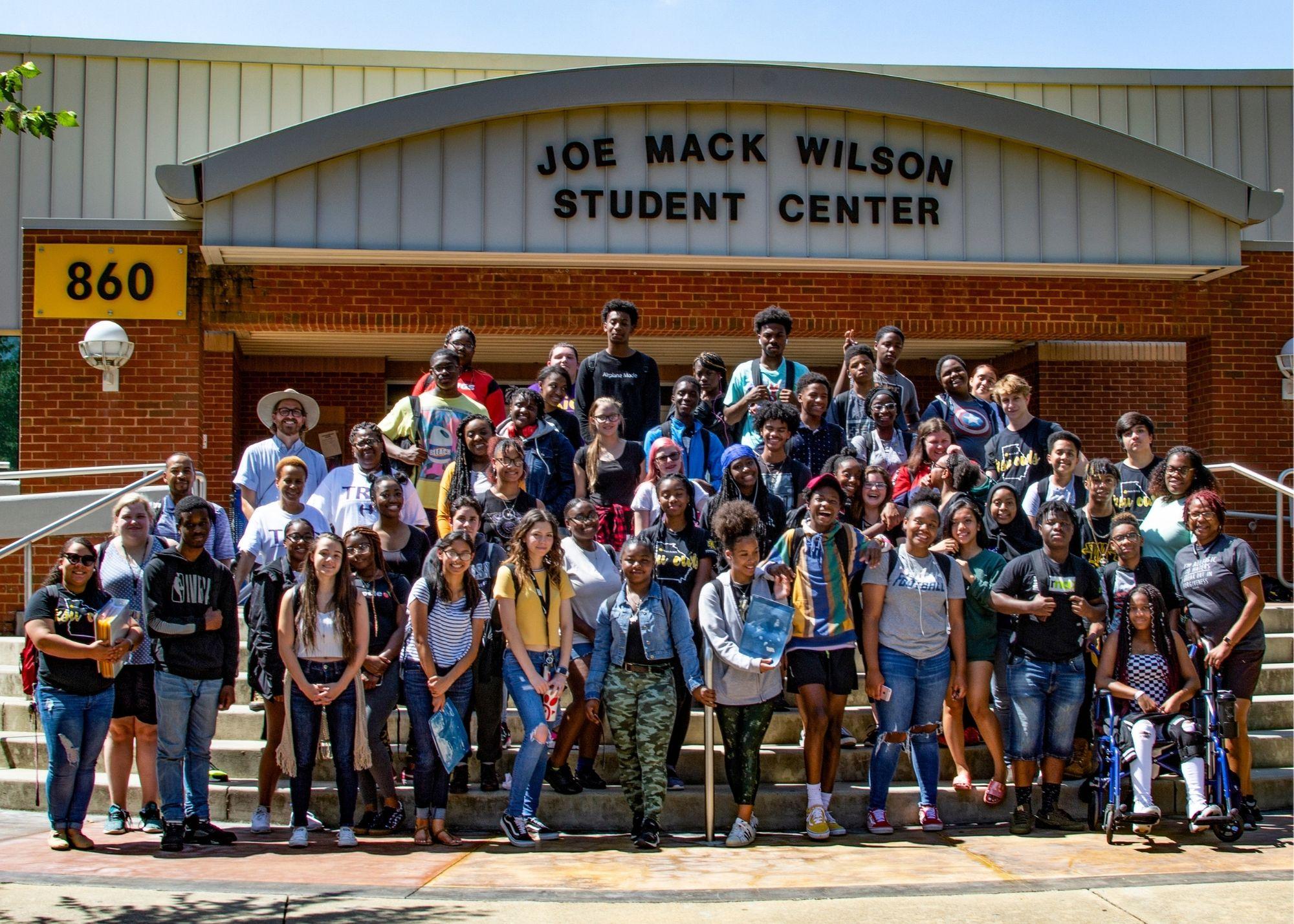 Students outside standing in front of the Joe Mack Wilson Student Center / KSU TRiO holds an annual Summer Academy to help prepare students for the upcoming school year and provide a space for students to explore potential career options