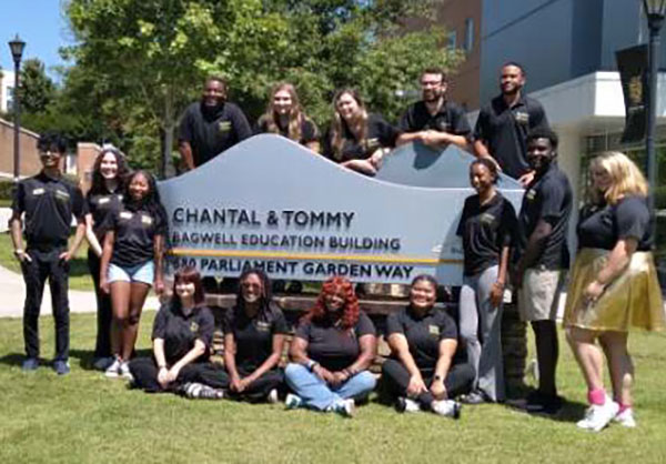 student ambassador group on the bagwell building sign