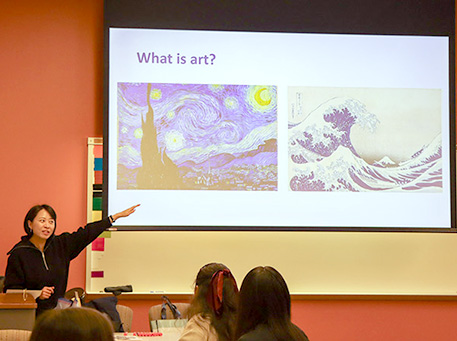 A professional instructor leading a breakout workshop at the Aspiring Educators of Tomorrow Conference.