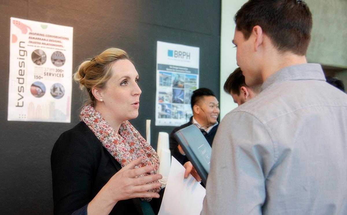  / Prospective employer speaking with future employee. Department of Architecture at KSU Annual Firm Networking Fair.