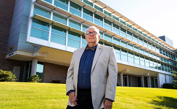 photo of dean rich outside ksu building