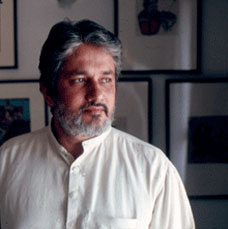 Hasan-Uddin Khan in white button-up. 