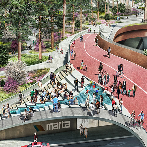 A crowd walking outside through beautifully designed stairs.