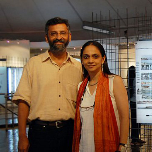 Anuradha Mathur and Dilip da Cunha posing together.