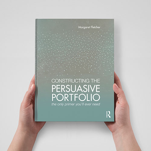 A pair of hands holding a book title "Constructing the Persuasive Portfolio".