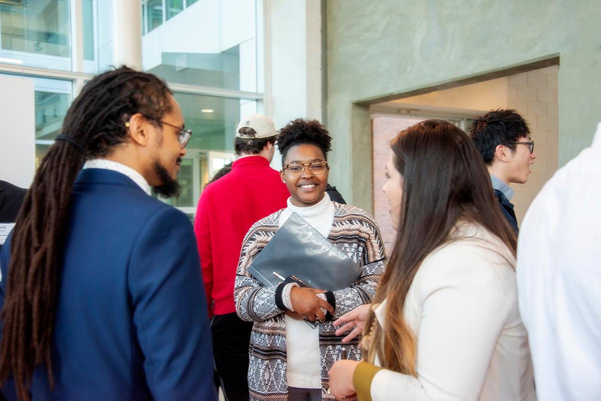 Prospective employer speaking with future employees.